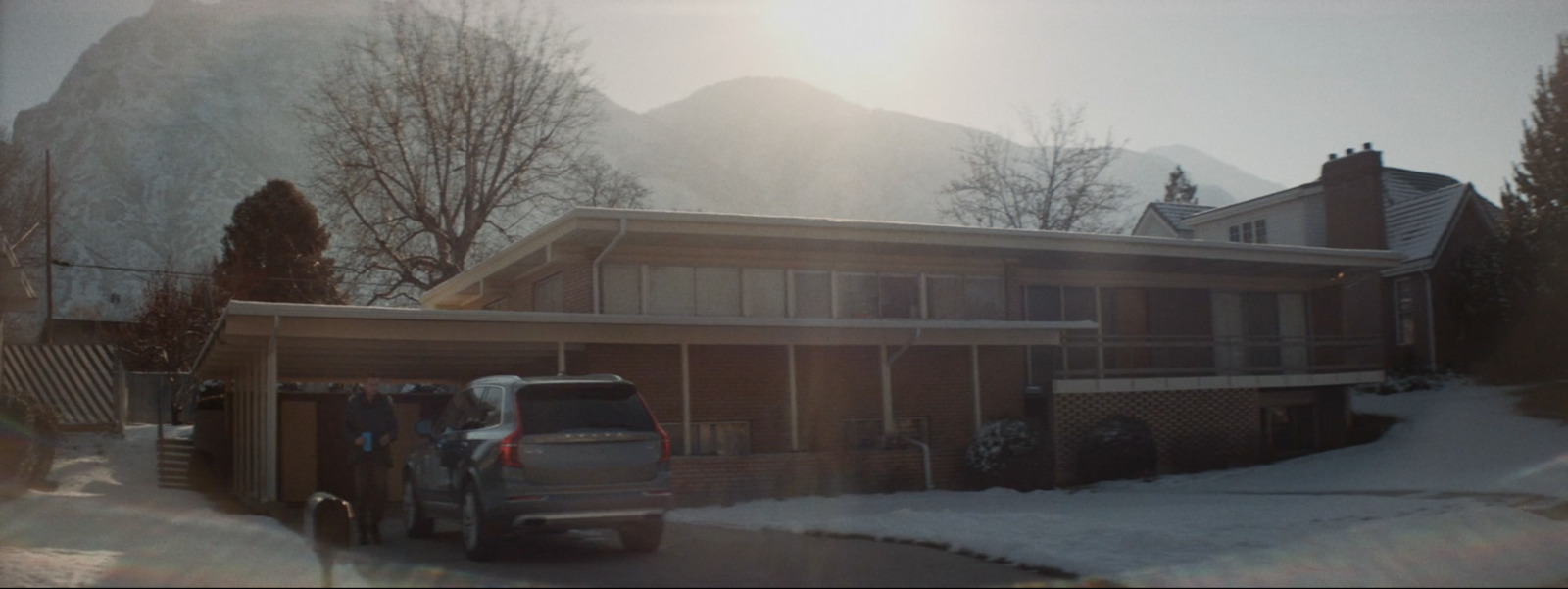 a truck is parked in front of a house