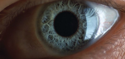 a close up of a person's blue eye