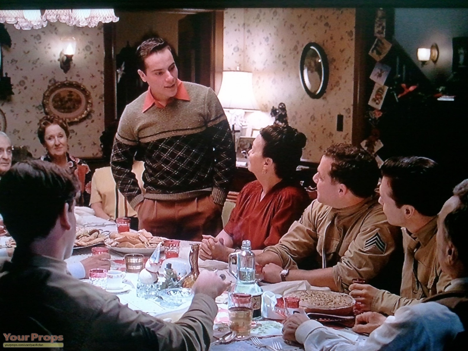 a group of people sitting around a dinner table