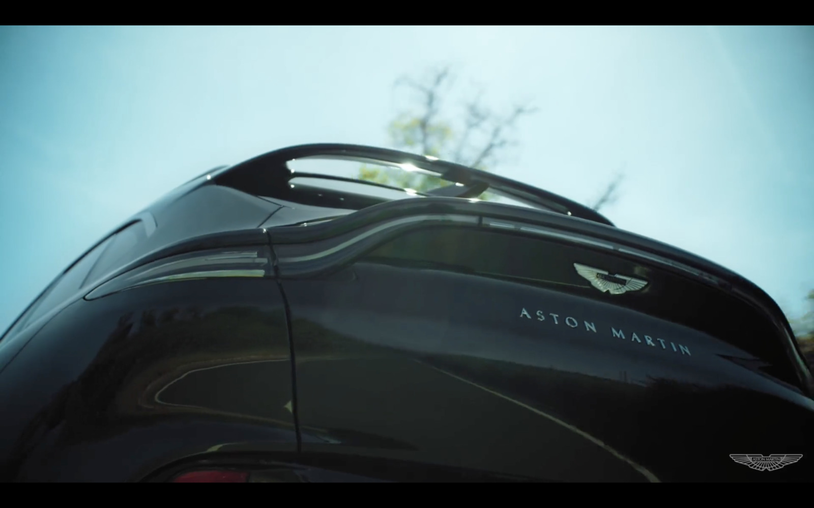 the back end of a black sports car