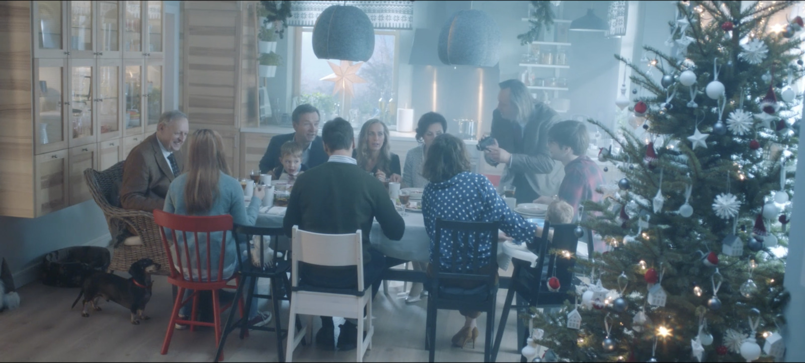 a group of people sitting around a table