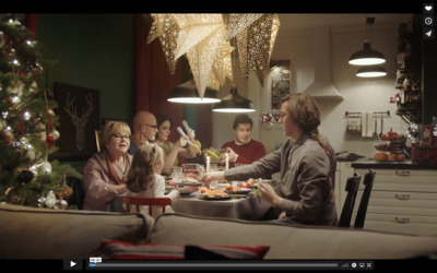 a group of people sitting around a table