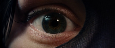 a close up of a person's blue eye