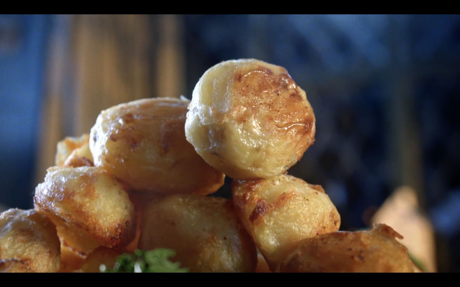 a pile of fried food sitting on top of a table