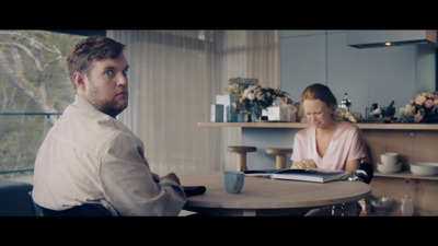 a man and a woman sitting at a table