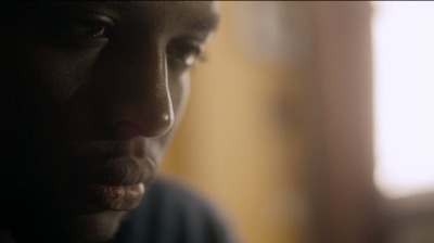 a close up of a person's face with a blurry background