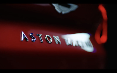 a close up of the emblem on a red car