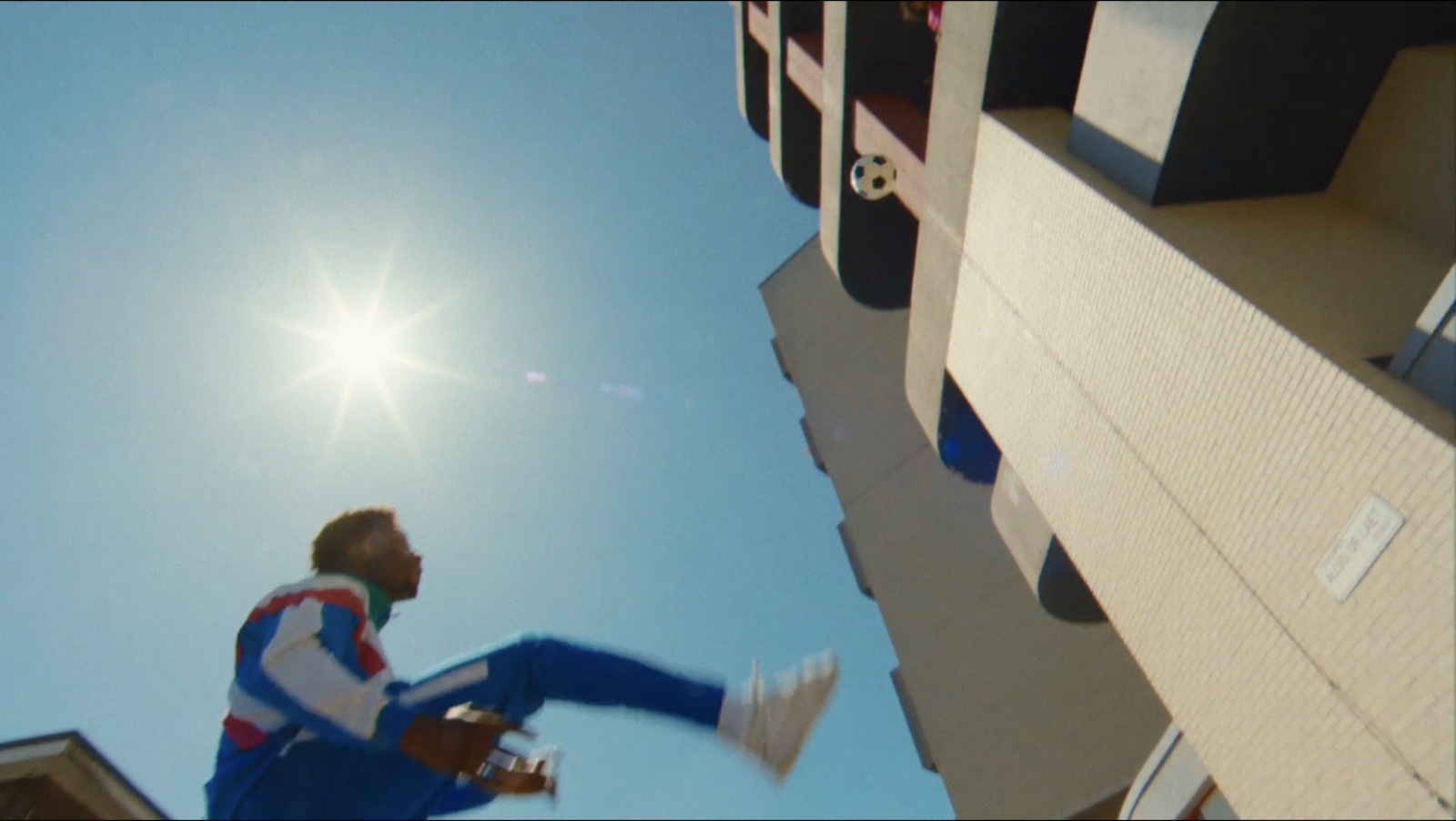 a man flying through the air while riding a skateboard