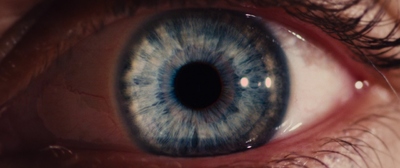 a close up of a person's blue eye