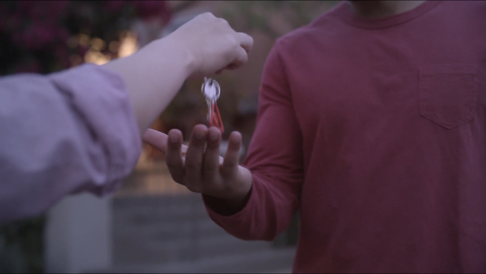 a person holding a toothbrush in their hand