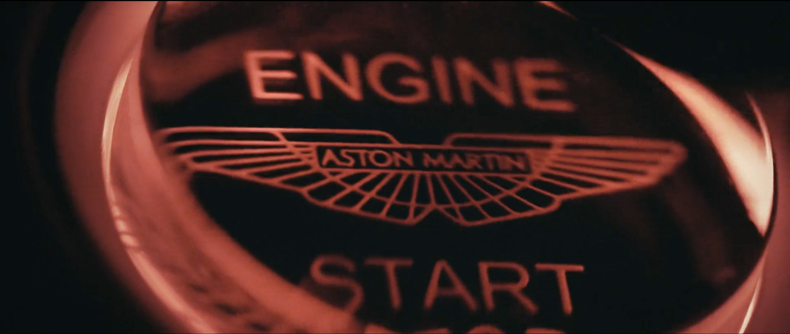 a close up of an engine start button on a car