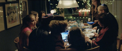 a group of people sitting around a table