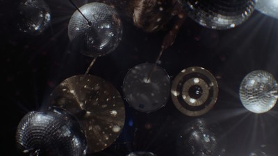 a group of disco balls hanging from a ceiling