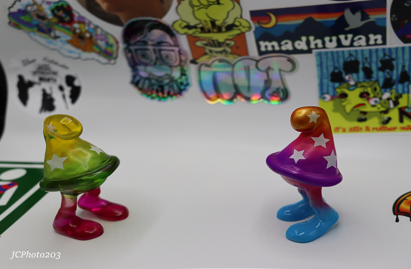 a couple of toy figurines sitting on top of a table