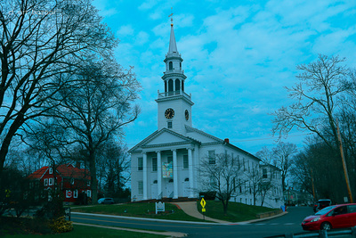 a church with a steeple and a clock tower