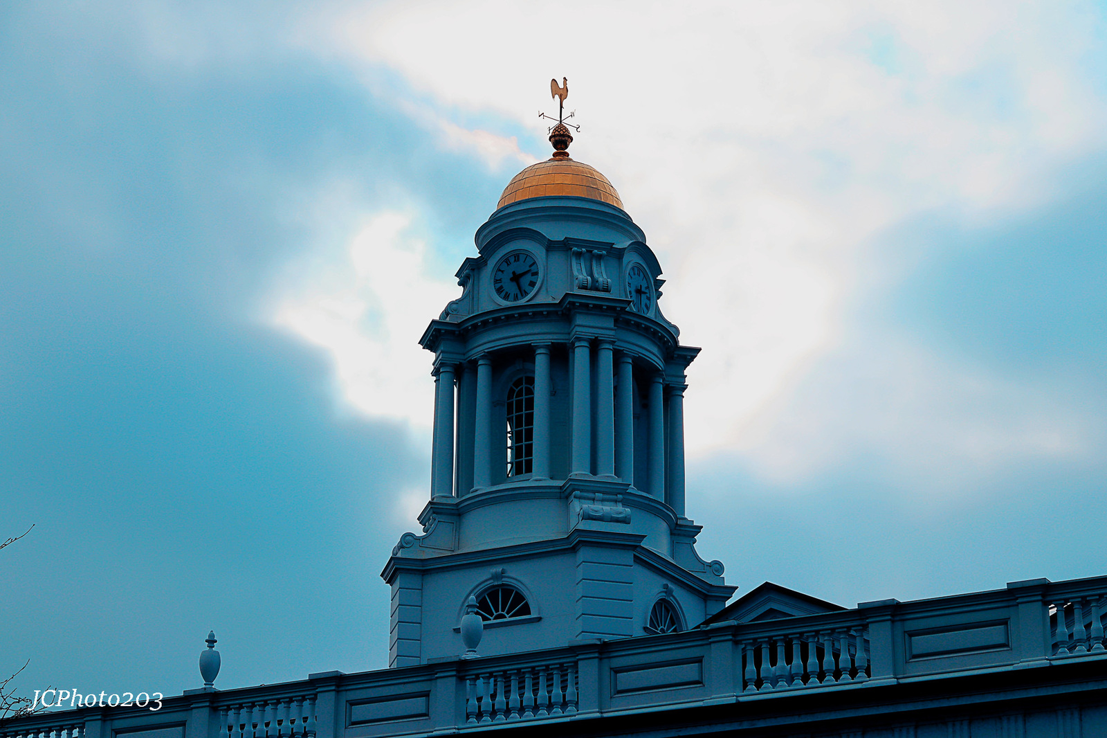 a tall building with a clock on the top of it