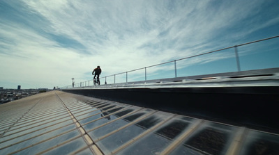 a man riding a skateboard on top of a roof