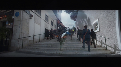 a group of people walking down a set of stairs