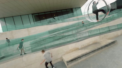 a man riding a skateboard down the side of a ramp