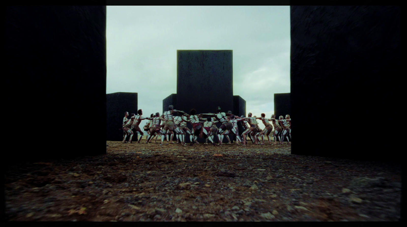 a group of people standing in front of a building