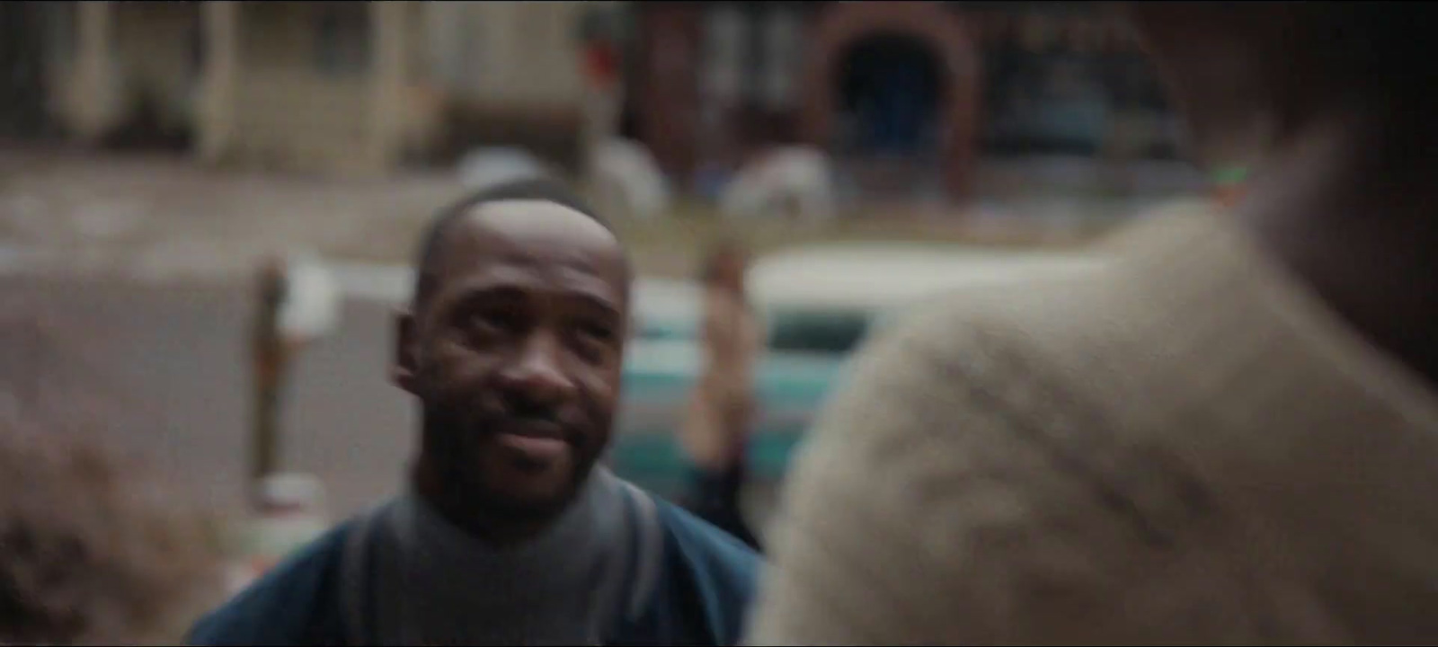 a man standing in the middle of a street