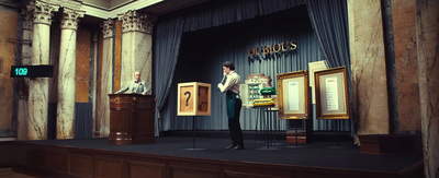 a man standing at a podium in front of a podium