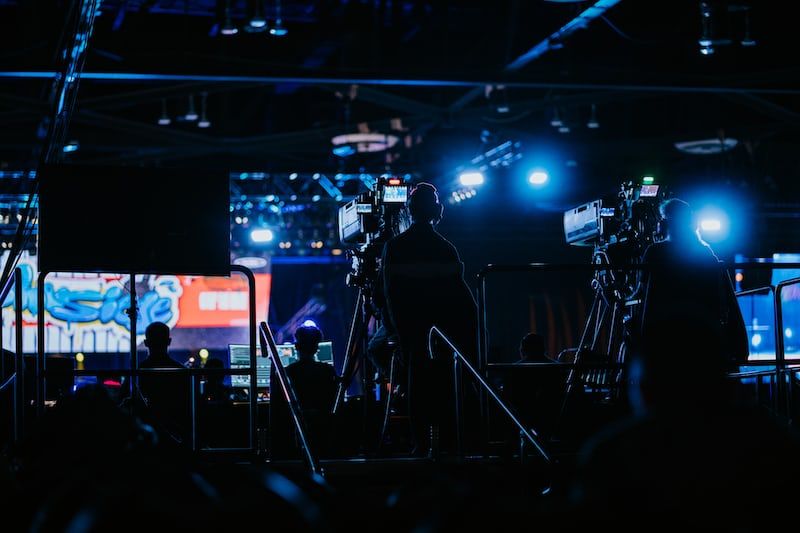 a group of people standing on top of a stage