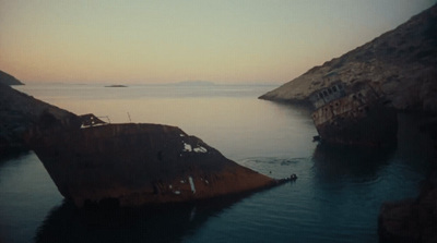 a large ship sitting in the middle of a body of water