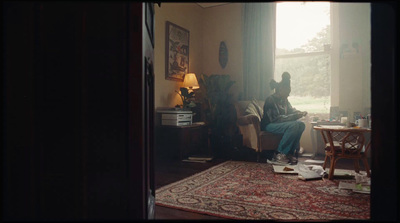 a person sitting in a chair in a room