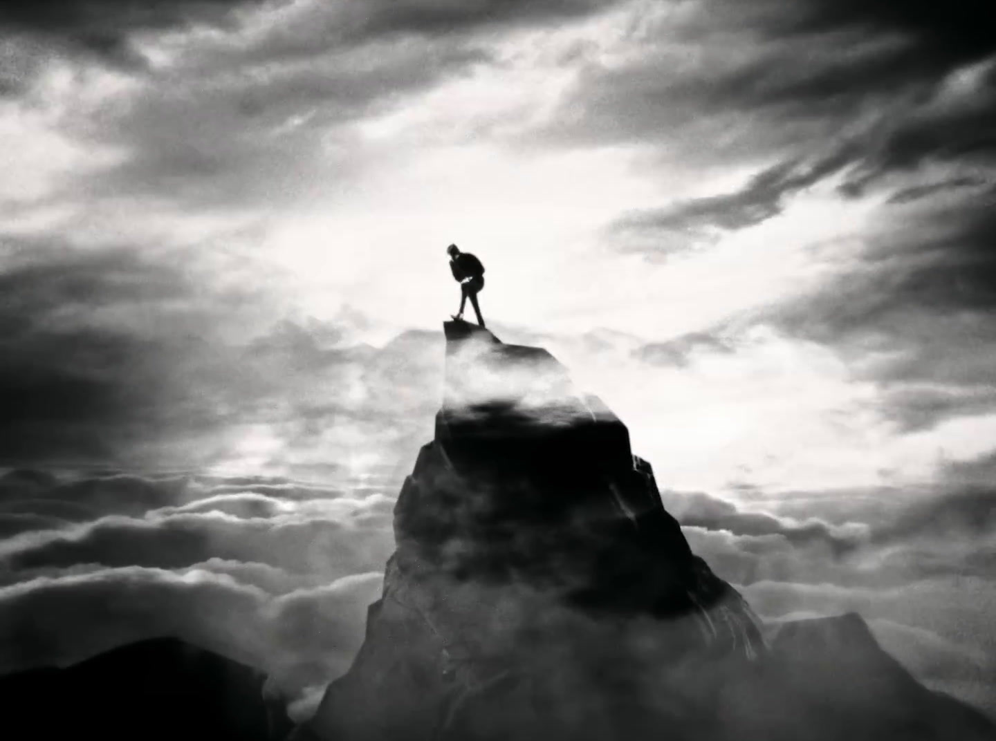 a person standing on top of a mountain