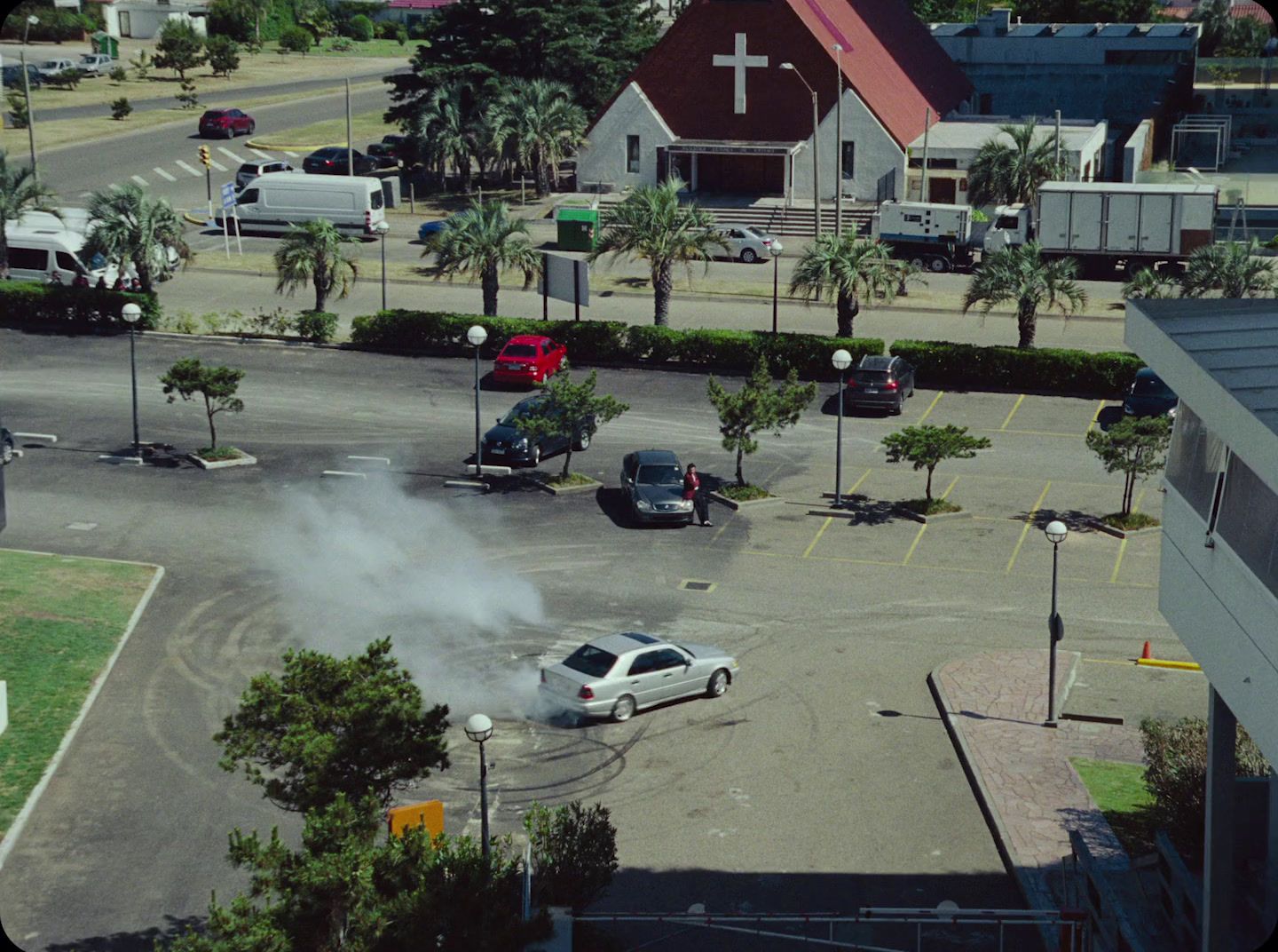 a parking lot with a lot of cars in it