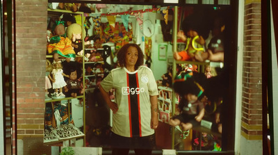 a man standing in front of a display of toys