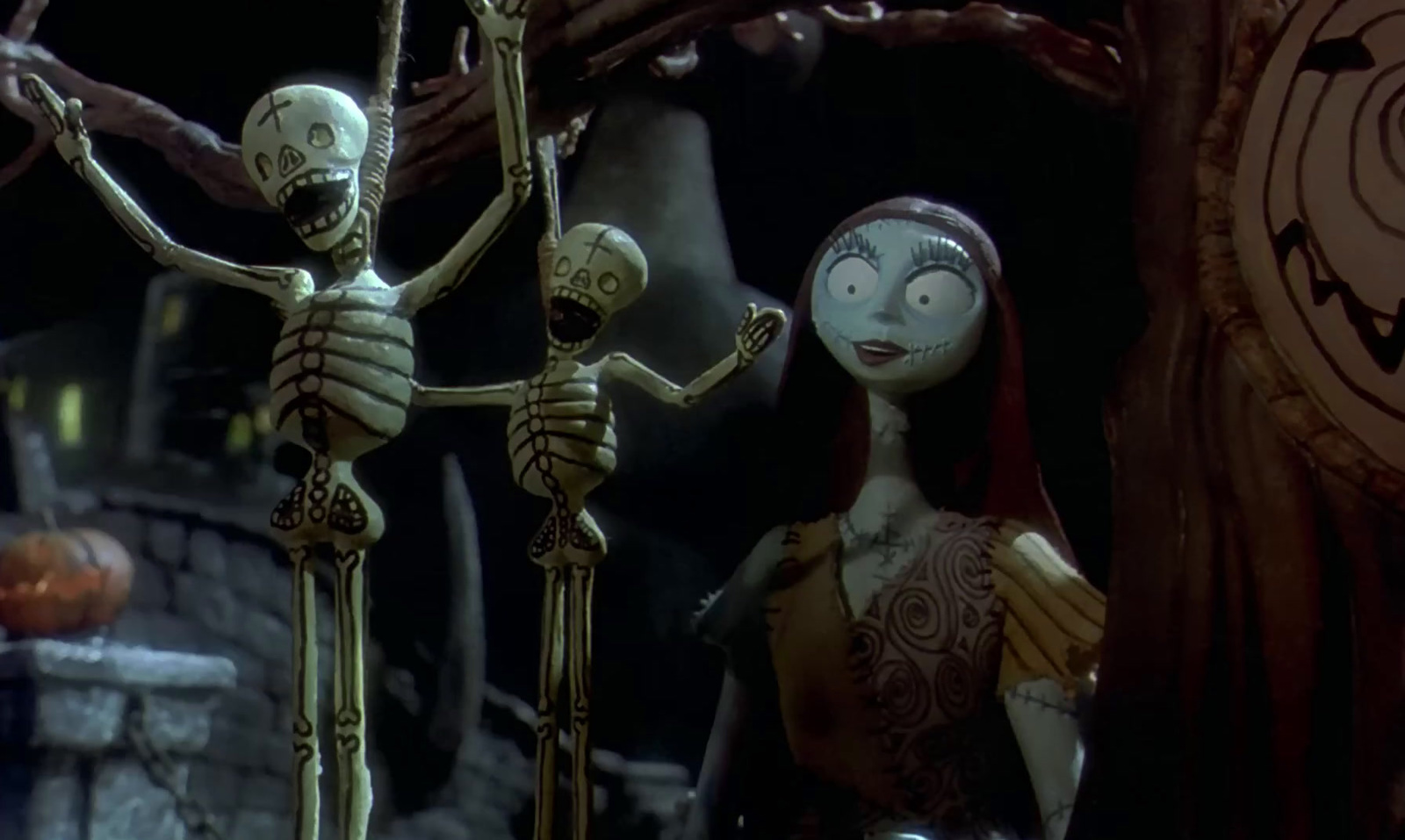 a couple of skeletons standing next to each other