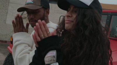 a man and a woman standing next to each other