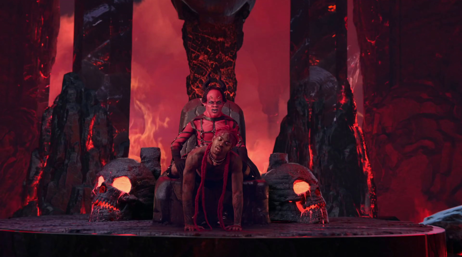 a man sitting on top of a giant throne