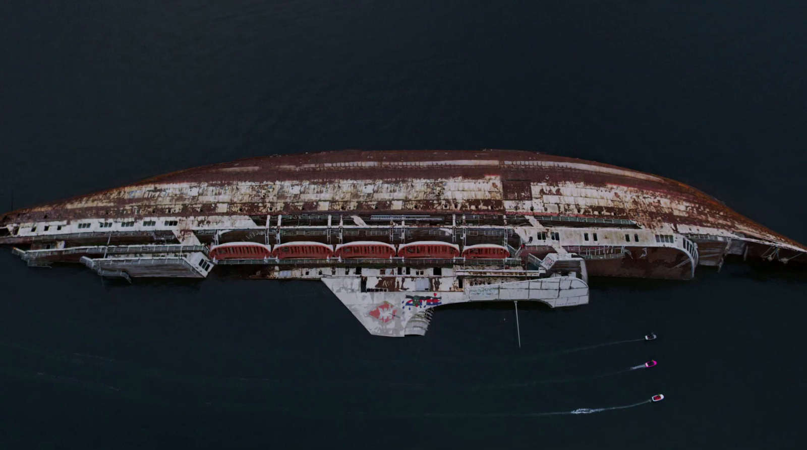 a large ship in the middle of a body of water