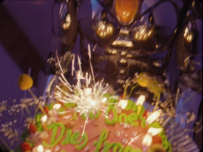 a close up of a cake with candles on it