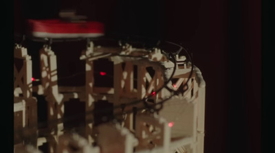 a close up of a clock with red lights