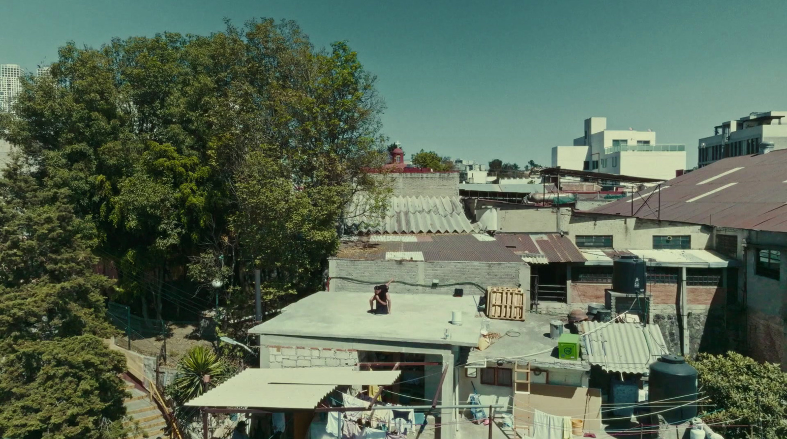 a group of buildings with clothes hanging out to dry