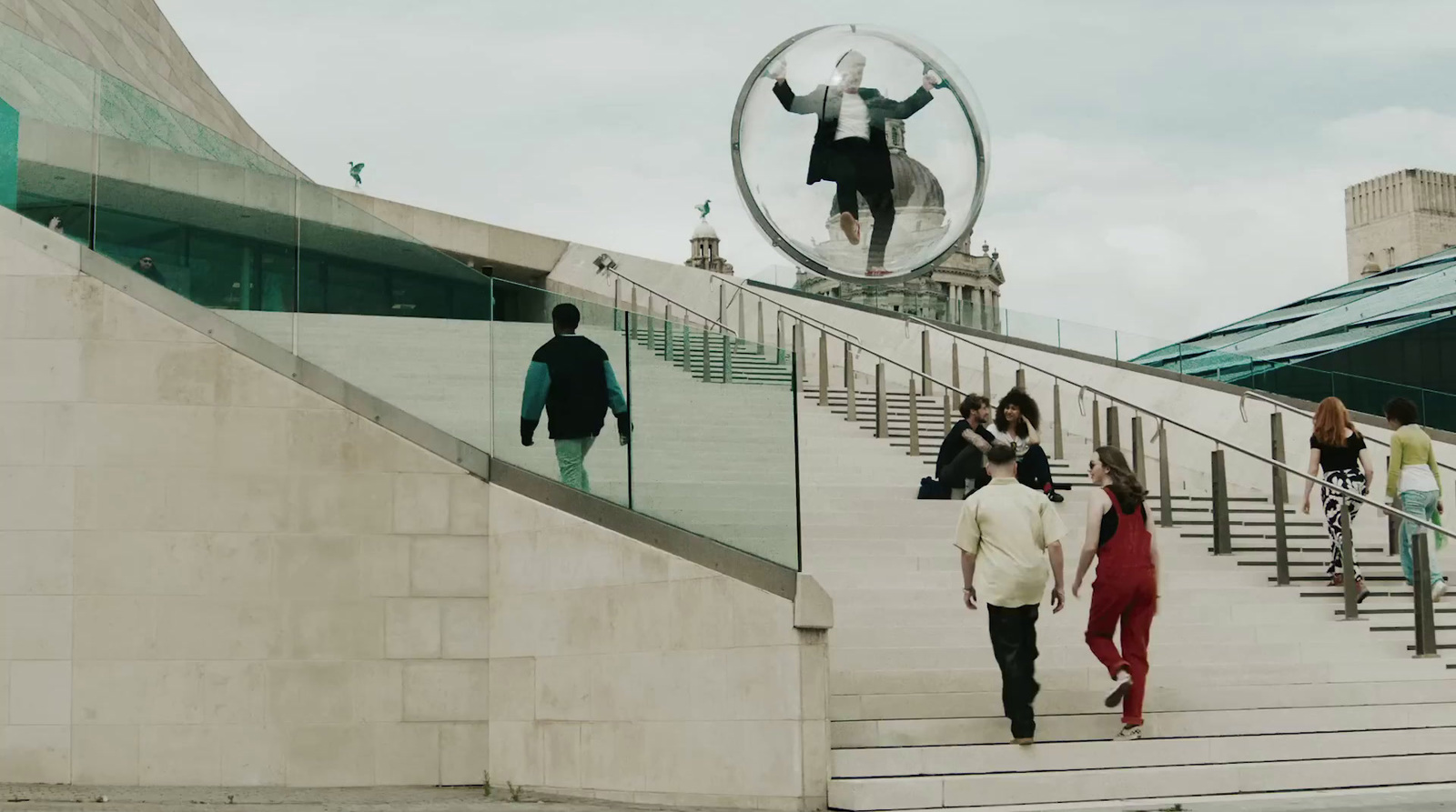 a group of people walking down a flight of stairs