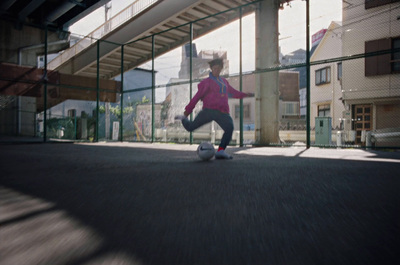 a person riding a skateboard on a city street