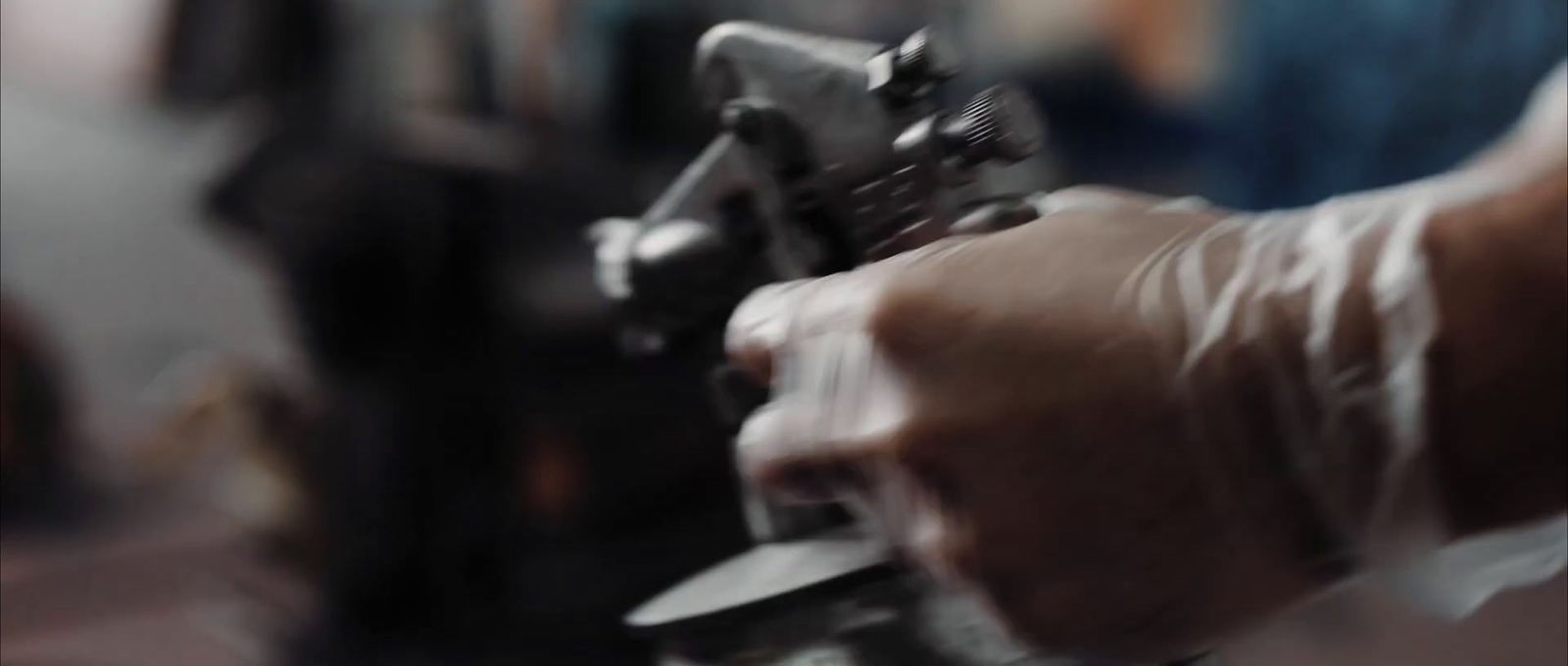 a close up of a person holding a machine