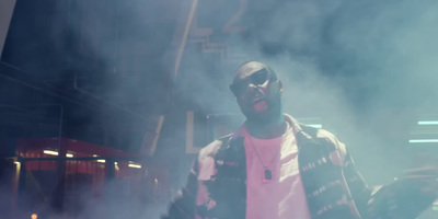 a man standing in a smoke filled room