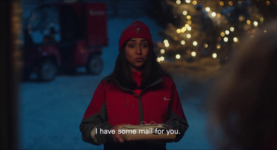 a woman in a red jacket and a red hat