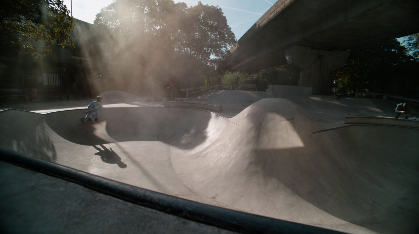 a man riding a skateboard up the side of a ramp