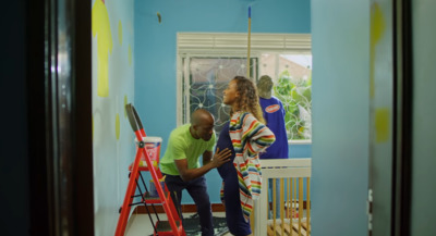 a couple of people that are standing in a room