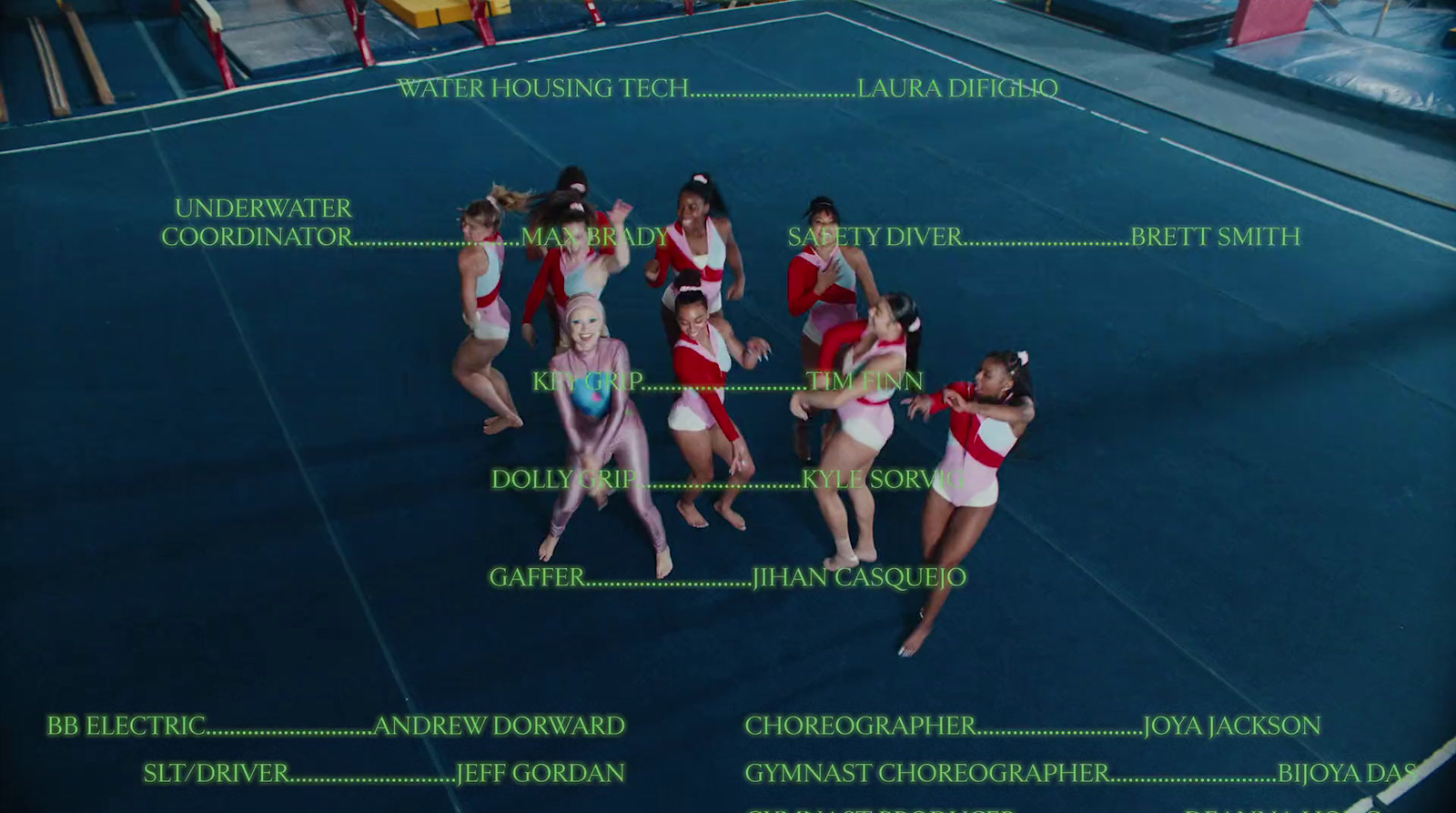 a group of women standing on top of a tennis court