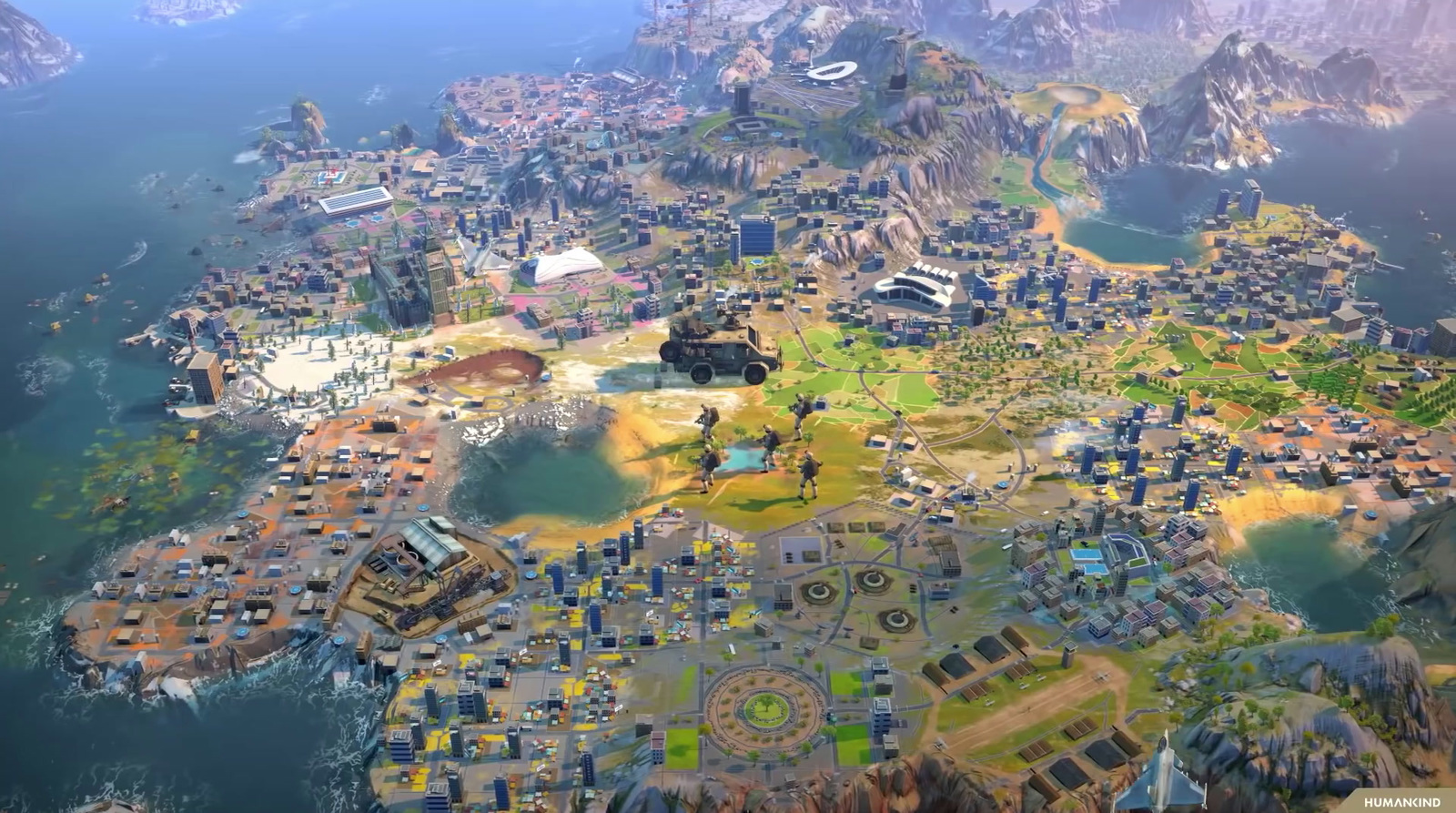 an aerial view of a large city surrounded by mountains