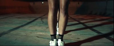 a woman's legs with black and white socks