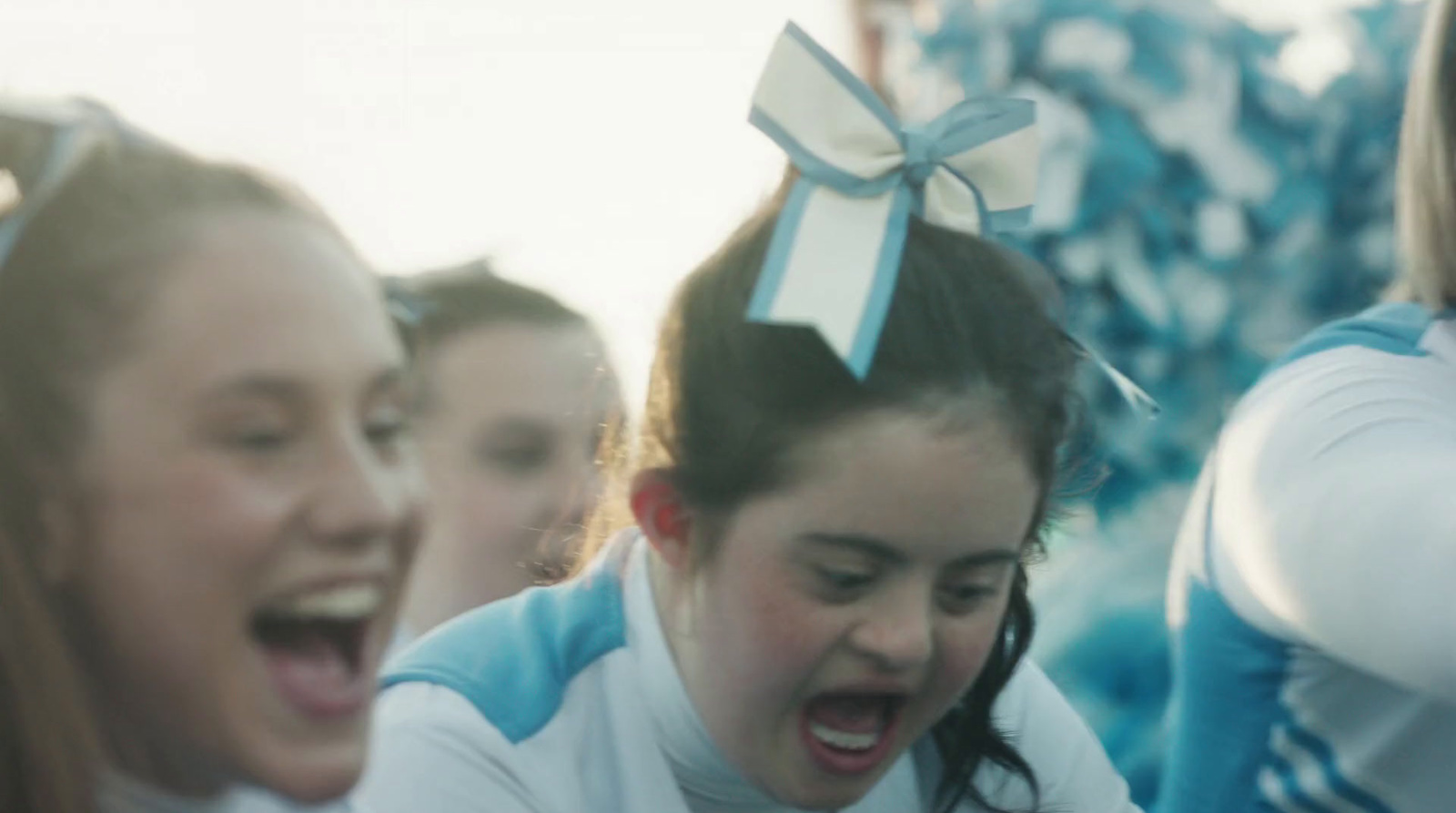 a group of girls laughing and laughing together